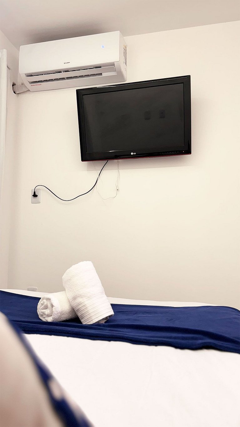 Suíte Família com AR frigobar bem no centro