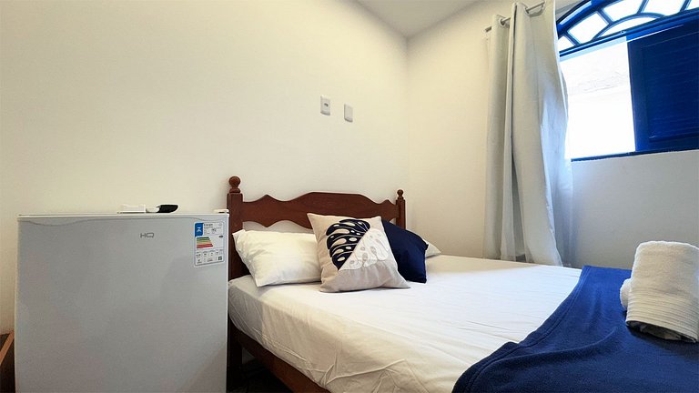 Suíte Família com AR frigobar bem no centro