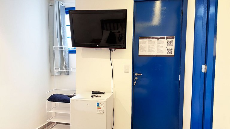 Suíte Família com AR frigobar bem no centro