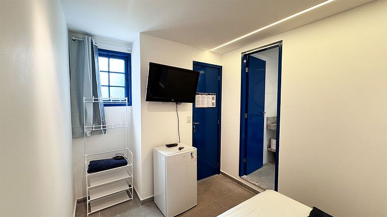 Suíte Família com AR frigobar bem no centro