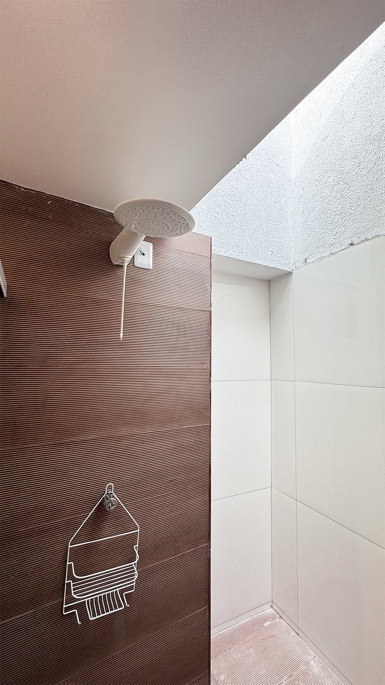 Suíte Família com AR frigobar bem no centro